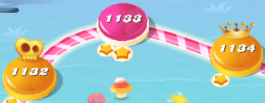 Golden crowns on the level map in Candy Crush Saga.