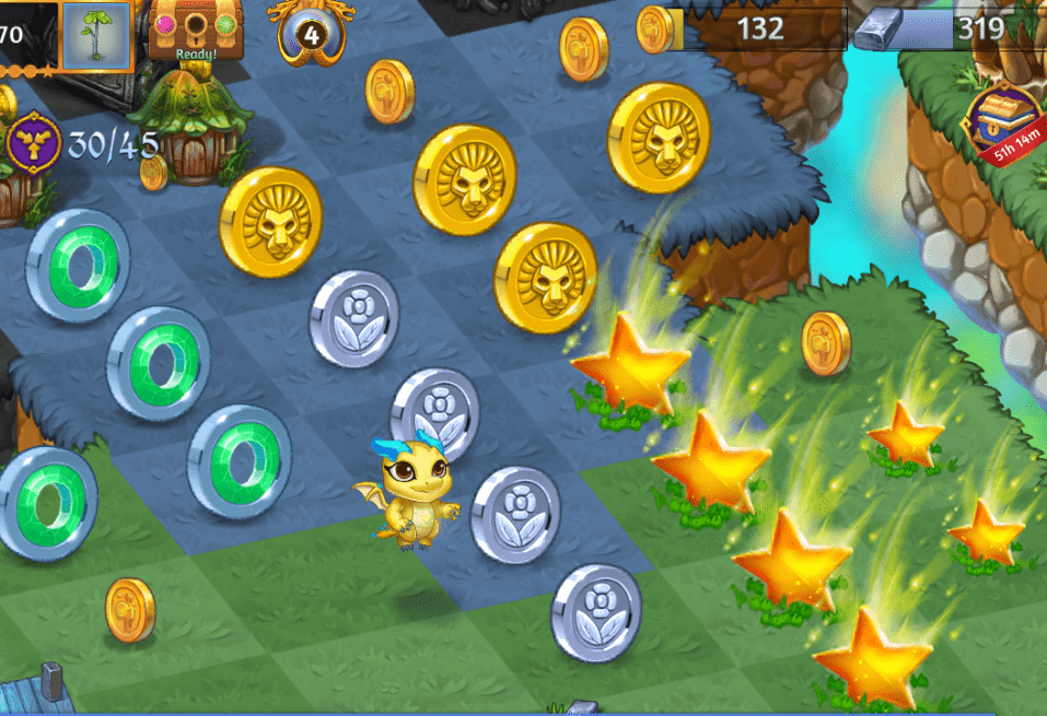 Some coins and reward stars stacked up neatly in rows.