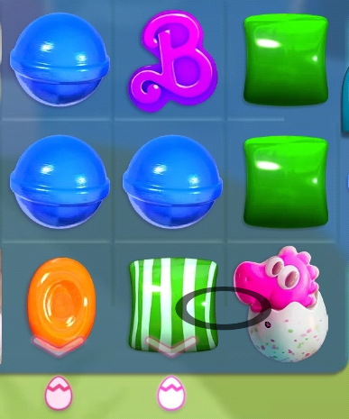 An example of how to free a stuck Candy Crush Saga gumi dragon. Make the match with the green candies and the dragon is free!